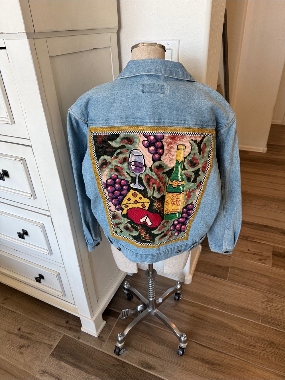Vintage Kolorway M denim jean jacket with needlepoint wine theme back panel